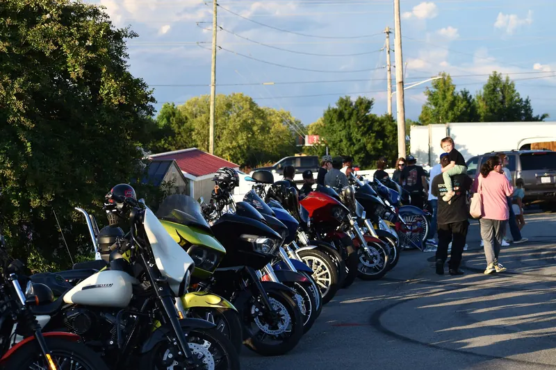 A long row of motorcycles at dusk at Eats on 601 in Mocksville